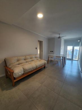DEPARTAMENTO 1 DOR CENTRICO CON COCHERA Y PARRILLA